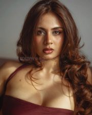Bold and Glamorous Srushti Bannatti in a Maroon Strapless Tube Top with a Black Satin High Waisted Skirt Photos 03