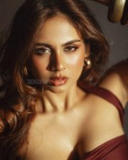 Bold and Glamorous Srushti Bannatti in a Maroon Strapless Tube Top with a Black Satin High Waisted Skirt Photos 05