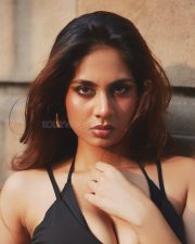 Captivating Actress Srushti Bannatti in a black halter lace up crop top photos 01