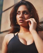 Captivating Actress Srushti Bannatti in a black halter lace up crop top photos 02