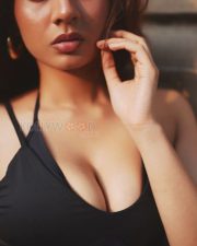 Captivating Actress Srushti Bannatti in a black halter lace up crop top photos 03