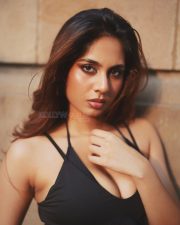 Captivating Actress Srushti Bannatti in a black halter lace up crop top photos 04