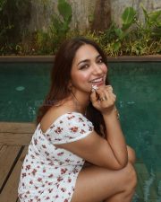 Delightful Actress Jiya Shankar in a White Floral Mini Dress Photos 02