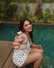 Delightful Actress Jiya Shankar in a White Floral Mini Dress Photos 05