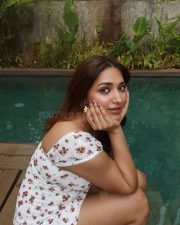 Delightful Actress Jiya Shankar in a White Floral Mini Dress Photos 07