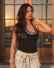Eye catching Actress Srushti Bannatti in a Black Studded Halter Top And Mini Skirt Photos 01