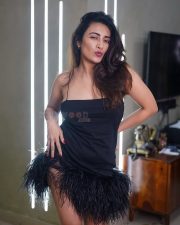 Glamorous Jinal Joshi in a Black Mini Dress with Feather Trim and Thin Straps Photos 04