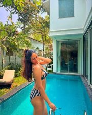 Hot Srushti Bannatti in a Green and White Striped Bikini Photos 03