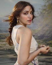 Kadhal Reset Repeat Heroine Jiya Shankar in a White Sleeveless Halter Neck Floral Dress Pictures 04