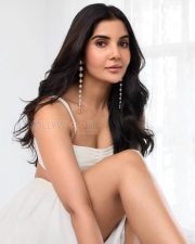 Mental Manadhil Heroine Madhuri Jain in a White Slit Skirt and Bralette Photos 02