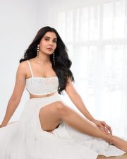 Mental Manadhil Heroine Madhuri Jain in a White Slit Skirt and Bralette Photos 05