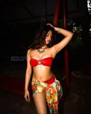 Sensual Srushti Bannatti Cleavage in a Red bandeau bikini and tropical print sarong Photos 01