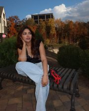 Sexy Jiya Shankar in a Black Satin Sleeveless Bustier Top with a Lace V Neckline and Light Blue Jeans Photos 03 Sexy Jiya Shankar in a Black Satin Sleeveless Bustier Top with a Lace V Neckline and Light Blue Jeans Photos 03