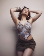 Sexy and Hot Srushti Bannatti in a Light Brown Sleeveless Halter Neck Top with a Furry Mini Skirt Pictures 01