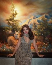 Stunning Jiya Shankar Cleavage in a Leopard Printed Long Fitted Dress Photos 02
