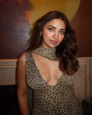 Stunning Jiya Shankar Cleavage in a Leopard Printed Long Fitted Dress Photos 04