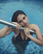 Sultry Srushti Bannatti Cleavage in a Black Swimsuit Photos 02