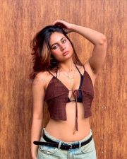 Tempting Srushti Bannatti in a Brown Crochet Tie Top with a Black Bra and Faded Jeans Photos 01
