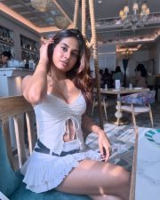 Winsome Actress Srushti Bannatti in a White Ruched Crop Top and Mini Skirt Photos 01