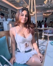 Winsome Actress Srushti Bannatti in a White Ruched Crop Top and Mini Skirt Photos 03