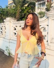 Winsome Actress Srushti Bannatti in a Yellow Sheer Tie Front Crop Top and Denim Jeans Photos 01