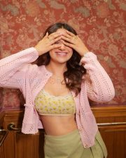 Winsome Jiya Shankar Legs in a Yellow Floral Bralette Pink Cardigan Sage Mini Skirt Photos 02