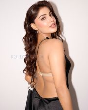 Striking Actress Ishita Raj in a Black Satin Backless Gown Photos 04