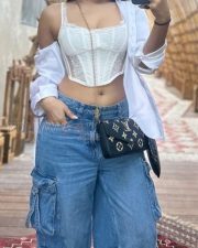 Stunningly Hot Ishita Raj in a Corset Style Crop Top and Blue Denim Photos 01