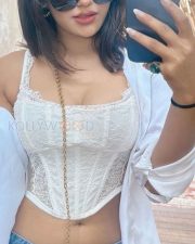 Stunningly Hot Ishita Raj in a Corset Style Crop Top and Blue Denim Photos 03