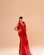 Wild Wild Punjab Actress Ishita Raj in a Red Draped Maxi Gown with a Deep Cleavage Neckline Pictures 02