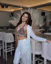 Sparkling Beauty Ridhiema Tiwari in a Sleeveless Bejewelled Bralette and White Pant Photos 01