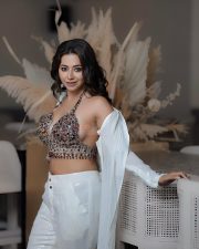 Sparkling Beauty Ridhiema Tiwari in a Sleeveless Bejewelled Bralette and White Pant Photos 02