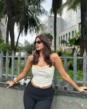 Chic Actress Shruti Chauhan in a White Ruffle Cami Black Skirt Photos 02 Chic Actress Shruti Chauhan in a White Ruffle Cami Black Skirt Photos 02