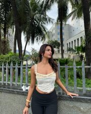 Chic Actress Shruti Chauhan in a White Ruffle Cami Black Skirt Photos 04 Chic Actress Shruti Chauhan in a White Ruffle Cami Black Skirt Photos 04