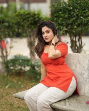 Glowing Actress Priyanka KD in a Orange Printed Kurti White Palazzo Pants Photos 06