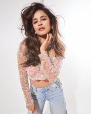 Popular Actress Chetna Pandey in a Glittering Round Neck Full Sleeve T Shirt and Blue Jeans Pictures 01