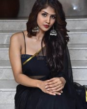 Saaree Movie Heroine Aaradhya Devi Sexy in a Black Saree with Sleeveless Blouse Photos 09