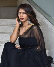 Saaree Movie Heroine Aaradhya Devi Sexy in a Black Saree with Sleeveless Blouse Photos 13
