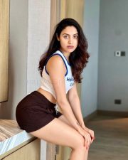 Sexy Priyanka Kholgade in a Mini Black Shorts and Hello Kitty Corset Type Crop Top Photos 01