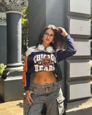 Sexy Shruti Chauhan in a Chicago Bears Crop Top and Grey Jeans Photos 04
