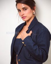 Striking Actress Chetna Pandey in a Navy Blue Denim Jacket and Bustier Photos 04