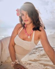 Tropical Beauty Chetna Pande in a Transparent White Beach Dress Photos 02