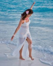 Tropical Beauty Chetna Pande in a Transparent White Beach Dress Photos 03