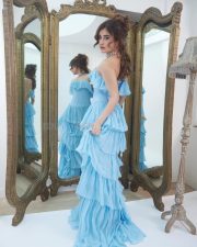 Actress Rasha Thadani in a Blue off Shoulder Corset Style Ruffle Gown Photos 04