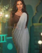 Alluring Actress Shivangi Verma in a White Pearl Saree with Brown Sheer Lace Blouse Photos 01