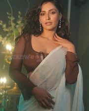 Alluring Actress Shivangi Verma in a White Pearl Saree with Brown Sheer Lace Blouse Photos 04