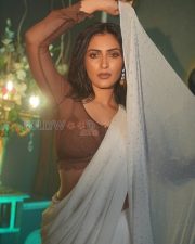 Alluring Actress Shivangi Verma in a White Pearl Saree with Brown Sheer Lace Blouse Photos 07