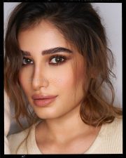 Charming Rasha Thadani in a Cold Shoulder Sweater Dress Photos 06