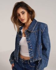 Cute and Chic Rasha Thadani in a White Crop Top with Denim Jacket and Jeans Pictures 03