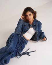 Cute and Chic Rasha Thadani in a White Crop Top with Denim Jacket and Jeans Pictures 09